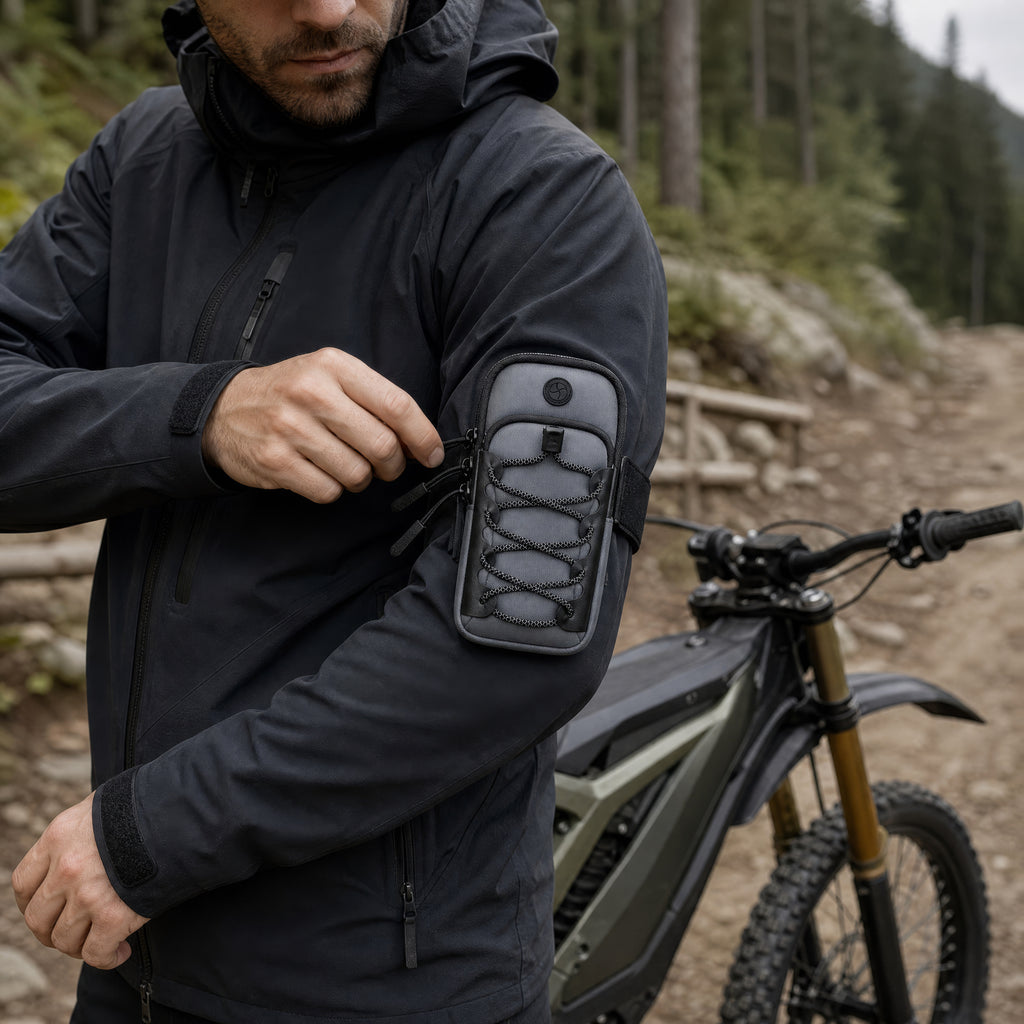 Trail rider wearing the Smoke Gray arm phone pouch